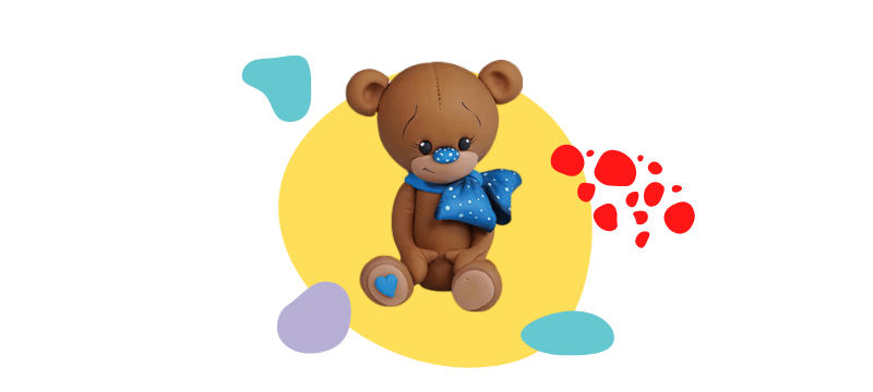 Teddybear with blue ribbon fondant cake topper